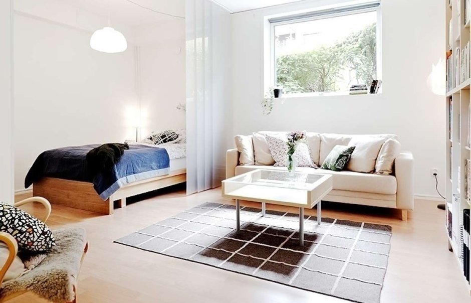 Спальня с диваном в скандинавском стиле