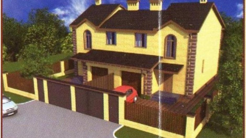 Двухэтажный дом с гаражом на 2 семьи