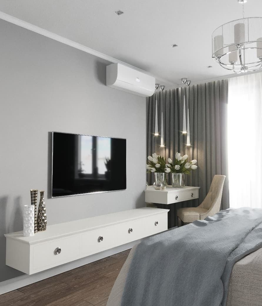 Интерьер спальни с телевизором