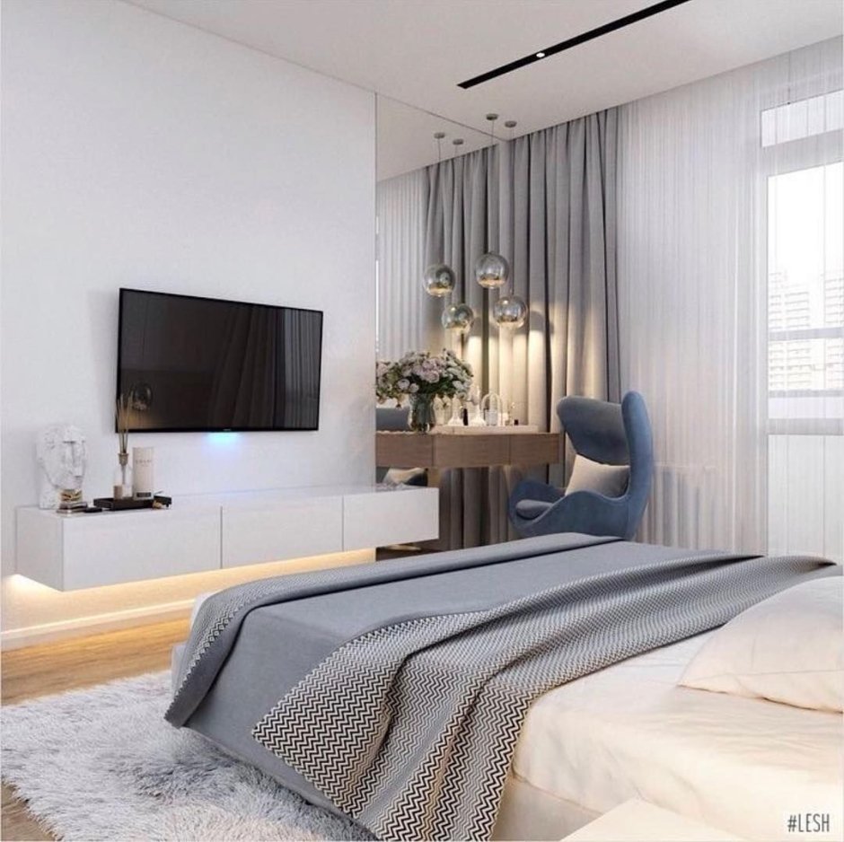 Телевизор на стене в спальне