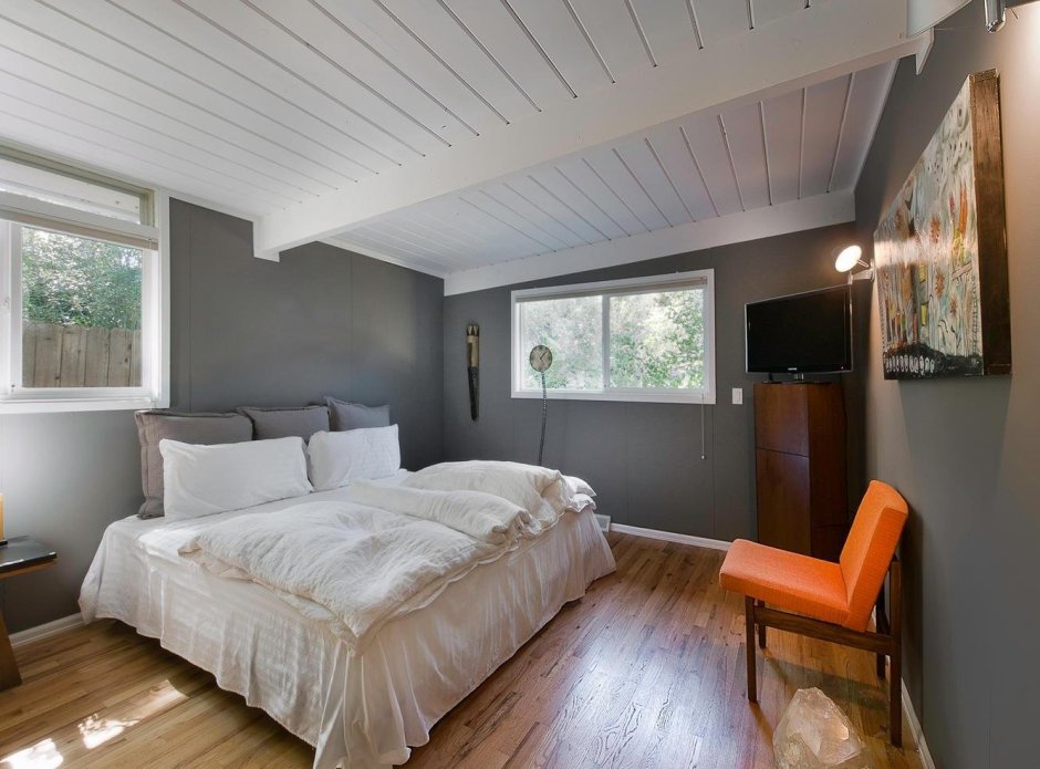 Серо желтый интерьер спальни