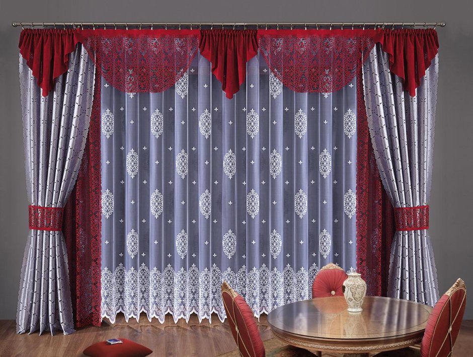 Тюль с вышивкой в интерьере гостиной