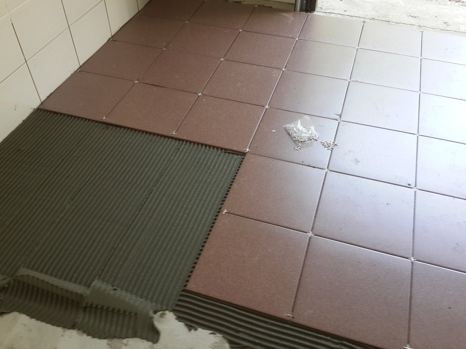 Укладка плитки на пол