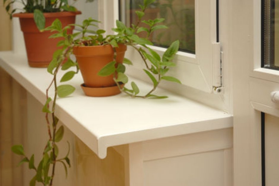 Подоконник пластиковый в интерьере