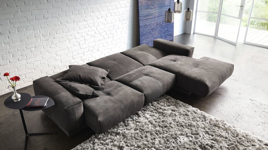 Двухсторонний диван для гостиной