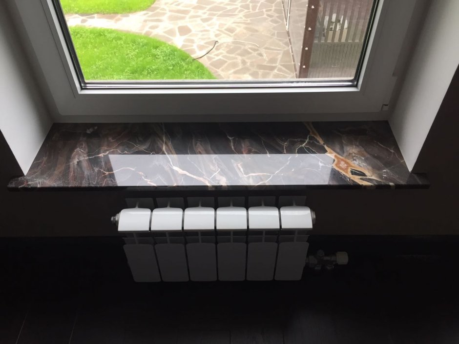 Пластиковые окна с каменным подоконником