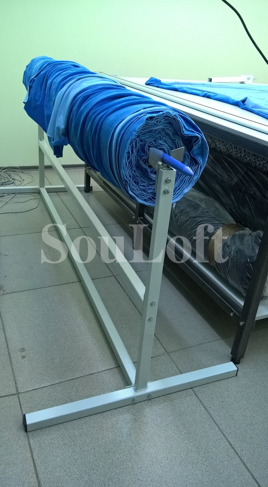 Размотчик ткани для раскройного