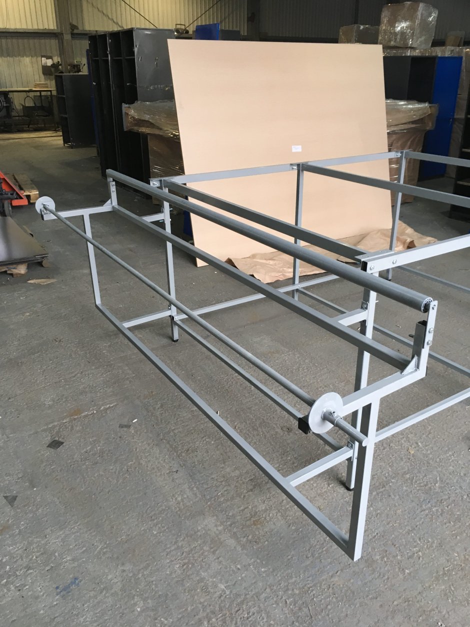 Размотчик к раскройному столу