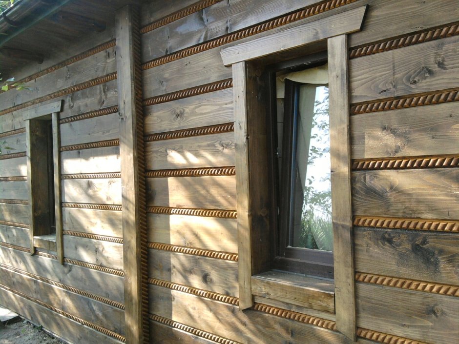 Дом обшитый доской