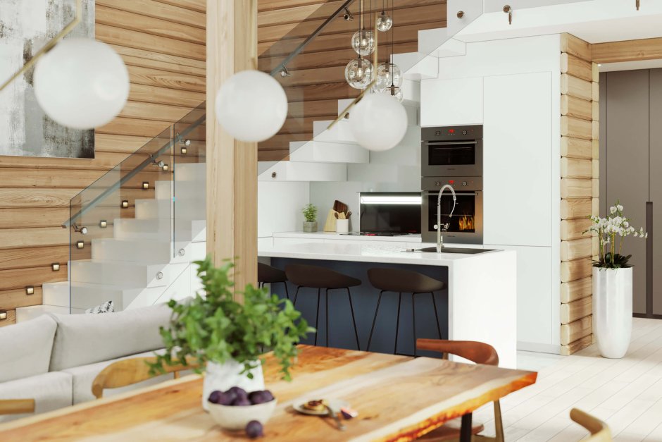 Интерьер кухни с лестницей на второй этаж