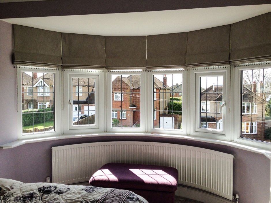 Римские шторы на эркерное окно