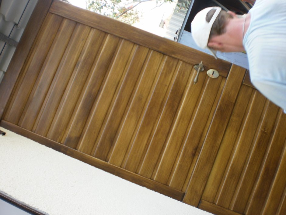 Железная дверь обшитая деревом