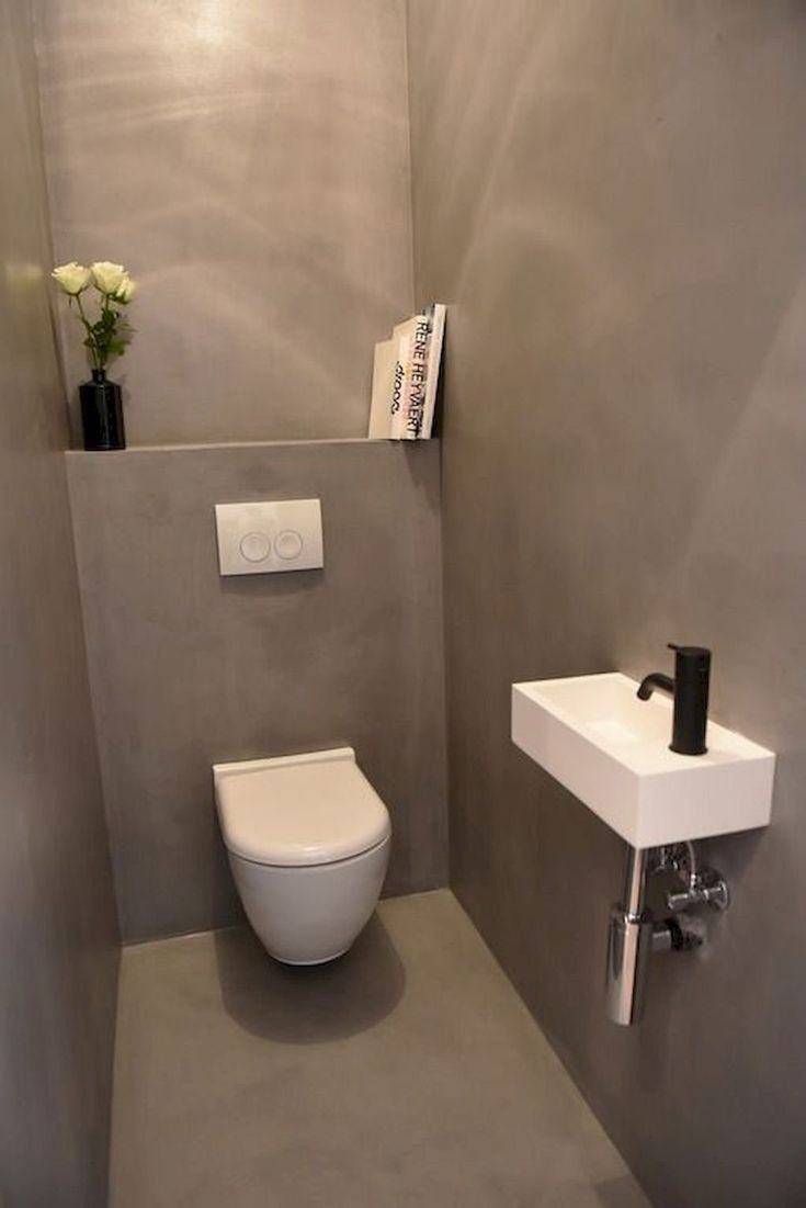 Туалетная комната с инсталляцией и раковиной
