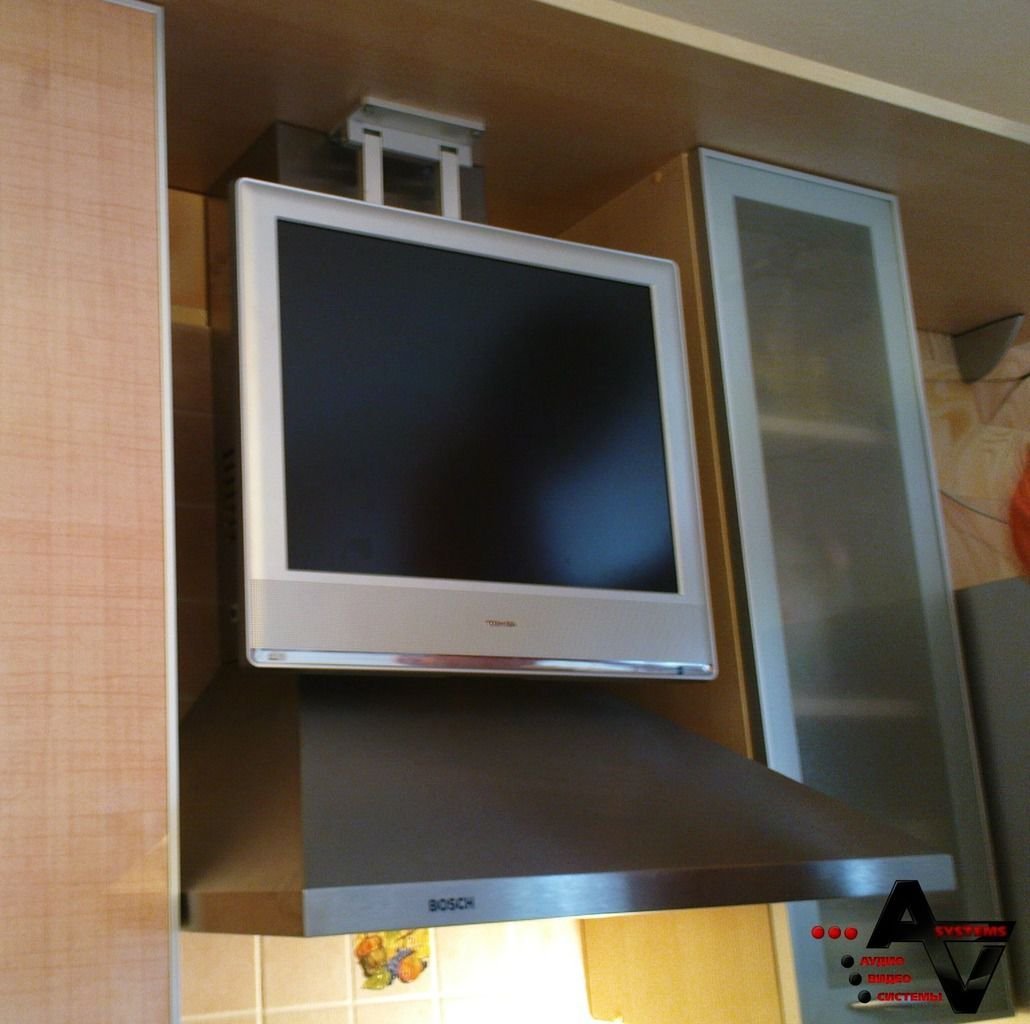 Включи телевизор на кухне. Телевизор на кухне. Подвесной телевизор на кухню. Встроенный маленький телевизор на кухню. Телевизор встроенный в кухню.