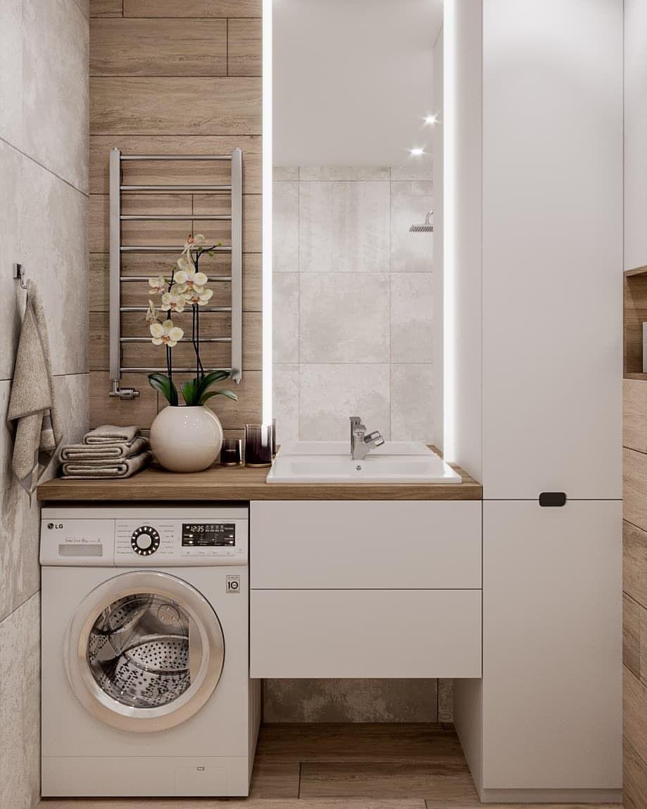Интерьер ванной комнаты со стиральной машиной