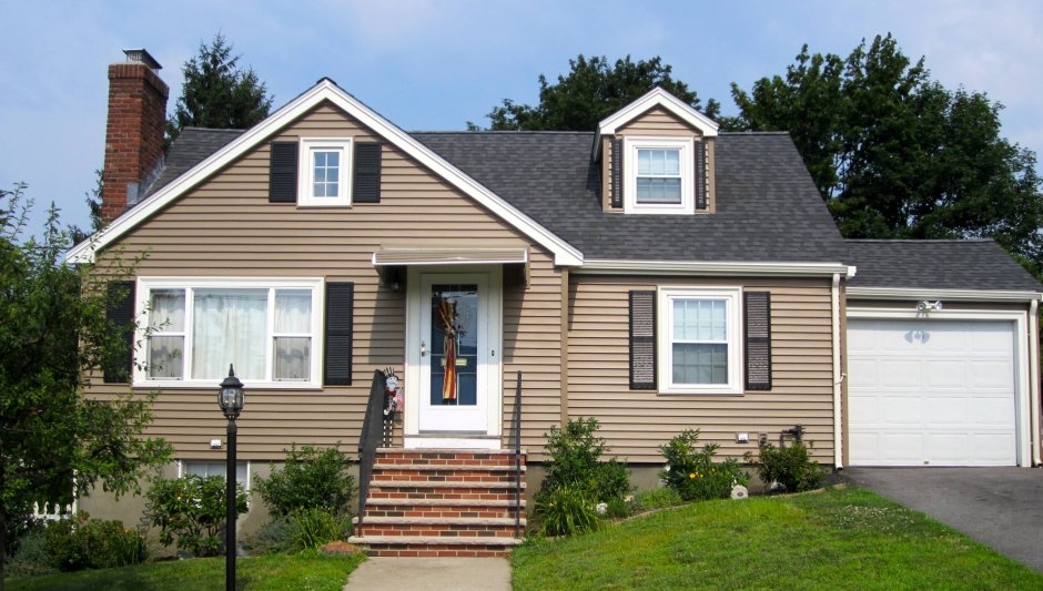 Темно коричневый дом