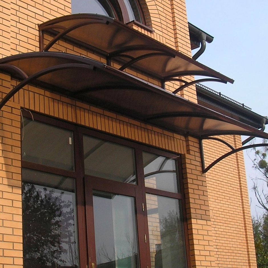 Фасад коттеджа с лоджией