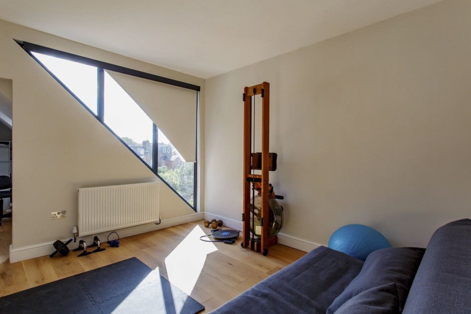 Рулонные шторы на треугольные окна