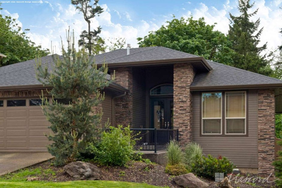 Одноэтажный дом из темного кирпича