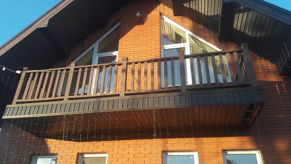 Ограждение балкона в деревянном доме