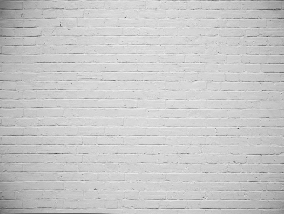 Белая кирпичная стена с полом фон