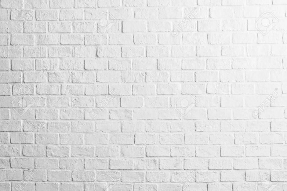 Белая кирпичная стена с полом