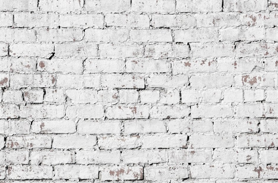 Кирпичная стена покрашенная в белый цвет