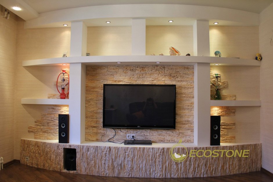 Стенка из гипсокартона под телевизор с камином