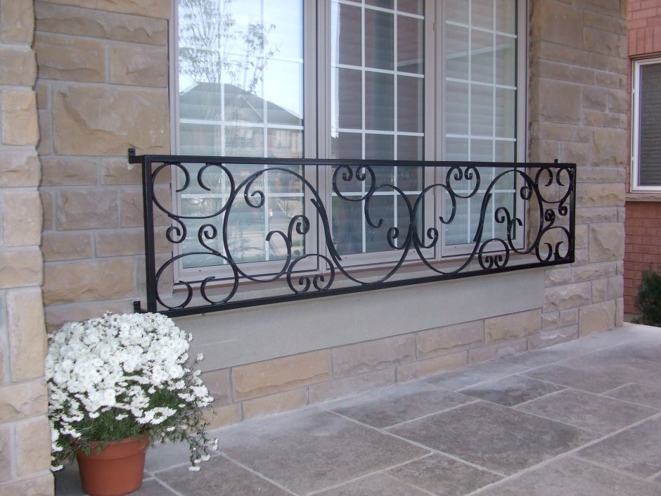 Художественная ковка ограждения балконов