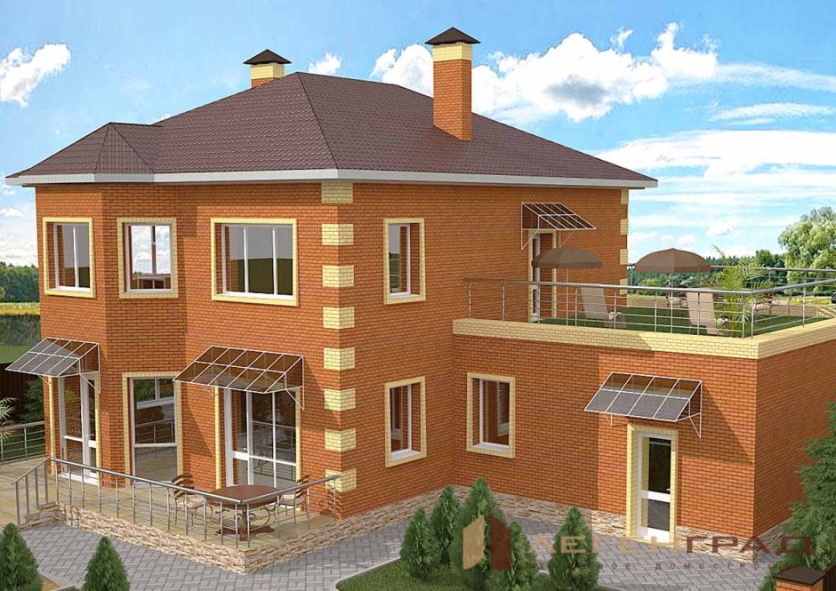 Двухэтажный дом с балконом из кирпича