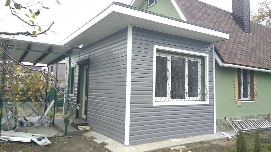 Барнхаус обшит лиственницей