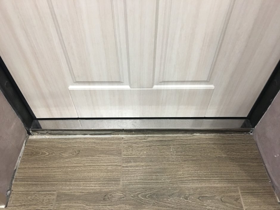 Отделка порога входной двери