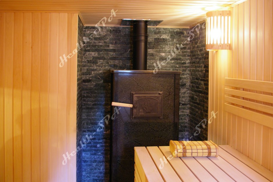 Печь на две комнаты в стену металлическая