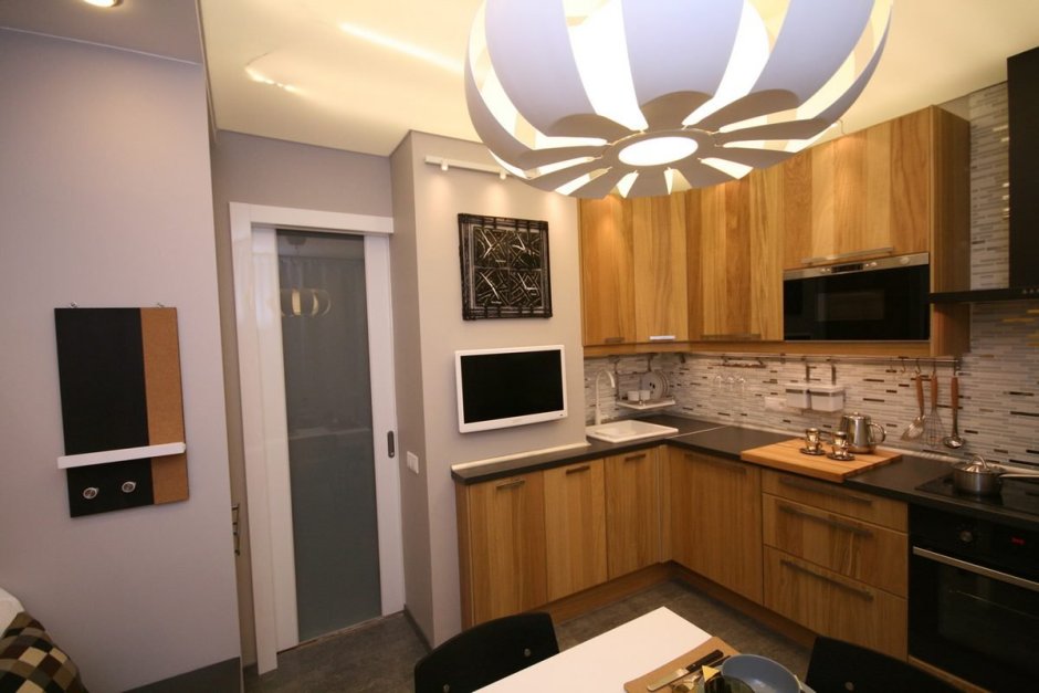 Угловой кухонный гарнитур с телевизором