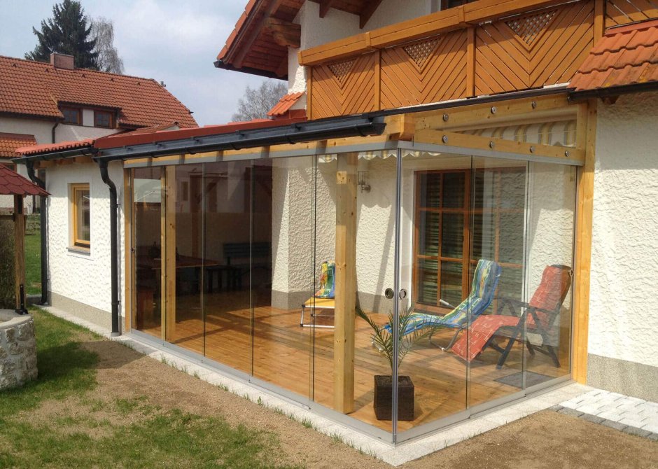 Веранда с летней кухней пристроенная к дому