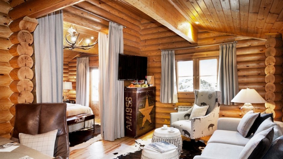 Скандинавский стиль интерьера в доме из бревна