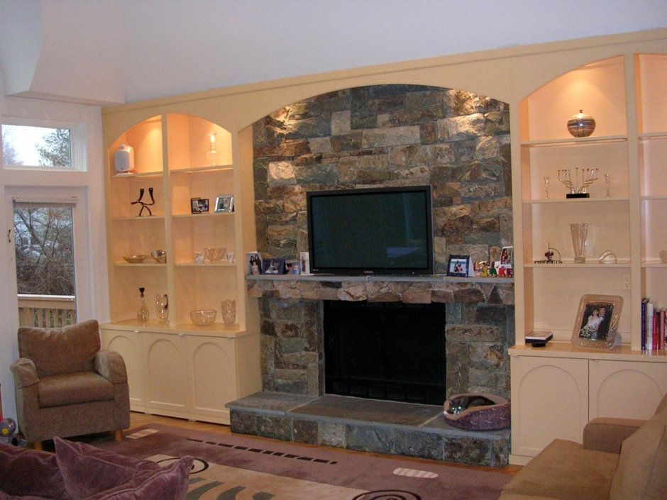 Стенка в гостиную с камином и телевизором