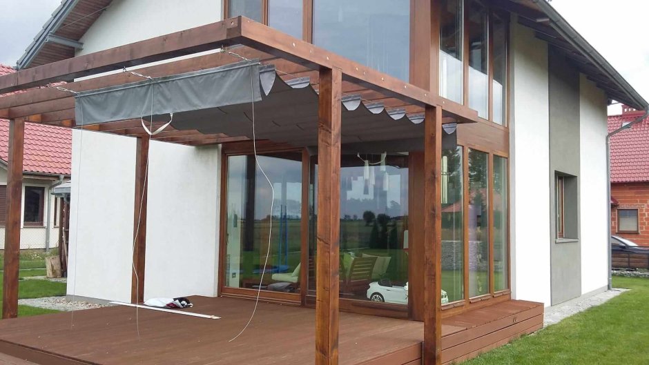 Складной навес над террасой