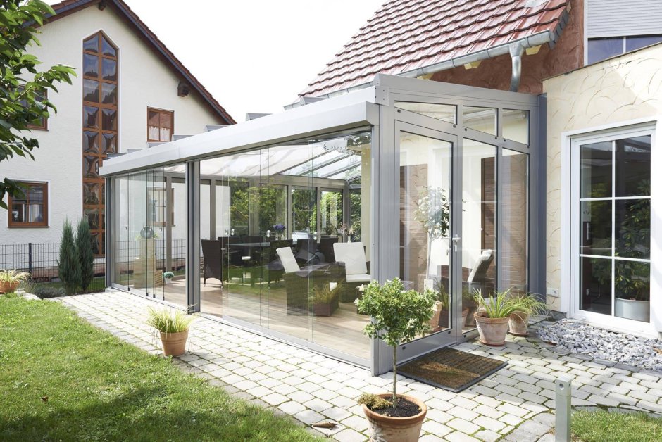 Веранда к кирпичному дому