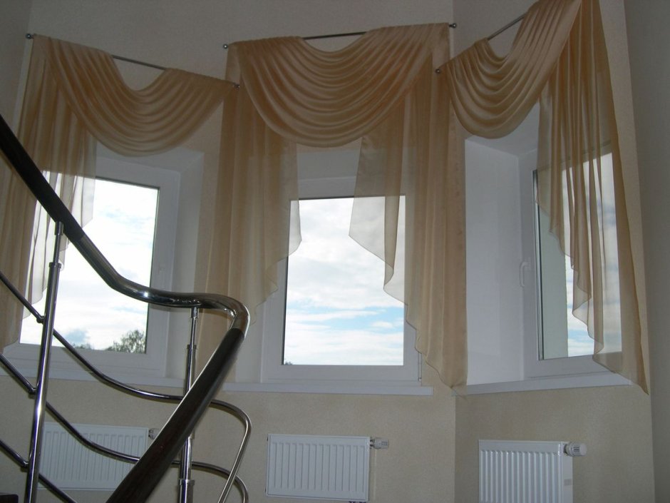 Римские шторы на арочные окна
