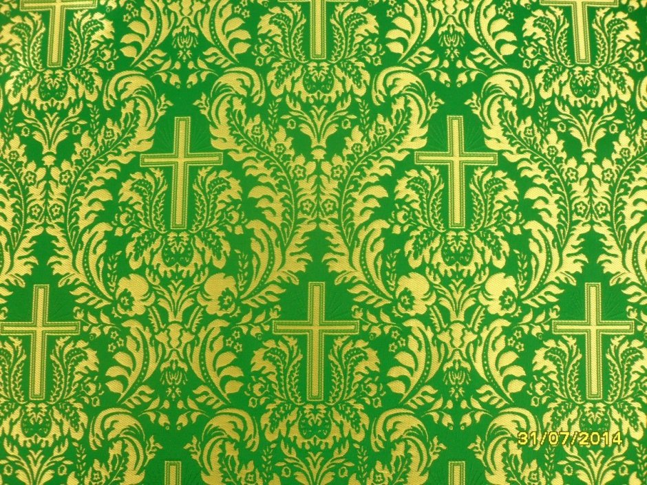 Зеленая ткань с орнаментом