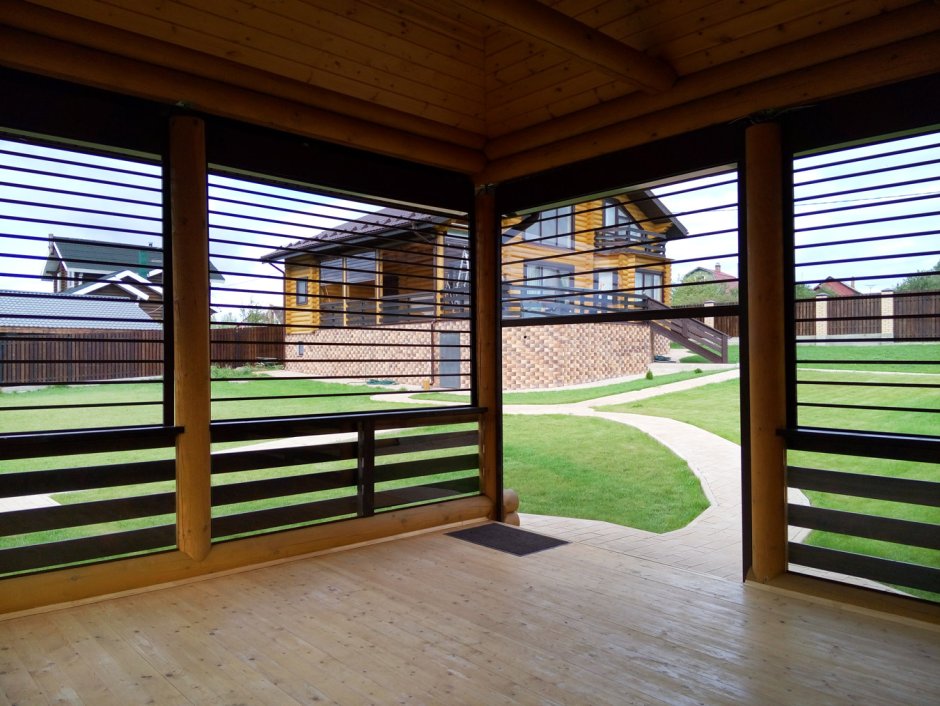 Прозрачные рольставни Алютех для веранды