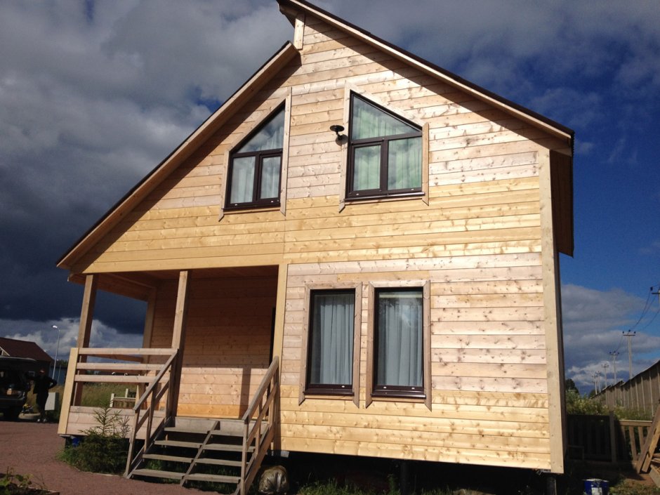 Обшить щитовой дом