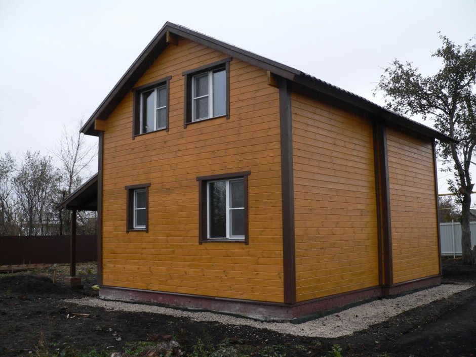 Обшивка каркасника имитацией бруса