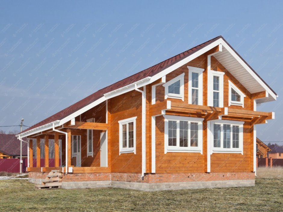 Оранжевый деревянный дом