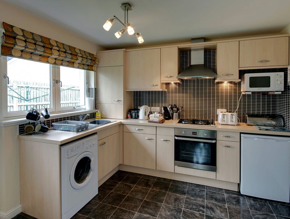 Стиральаня машины в кухни