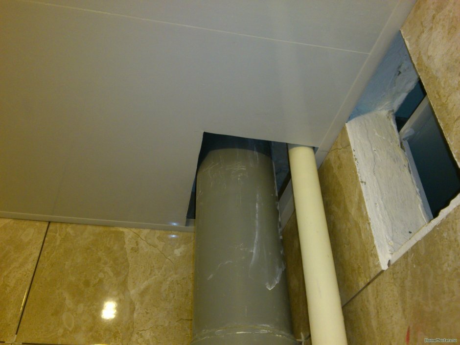 Натяжной потолок вокруг трубы