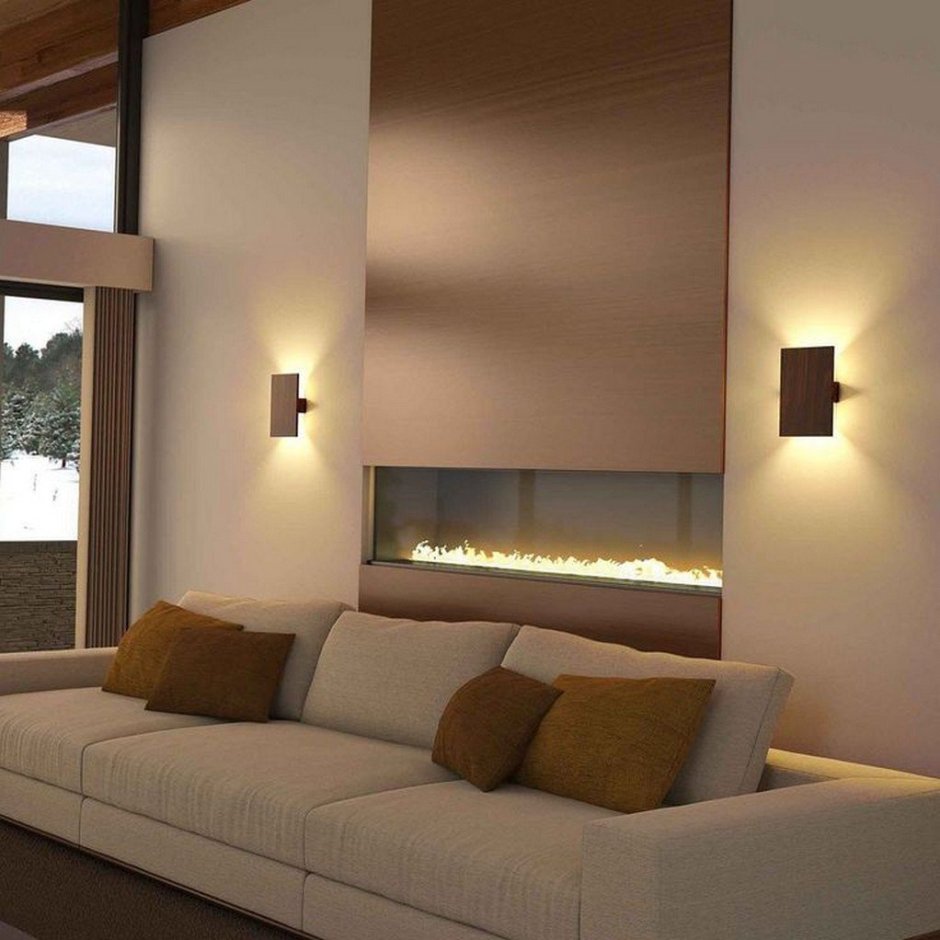 Настенные светильники над диваном