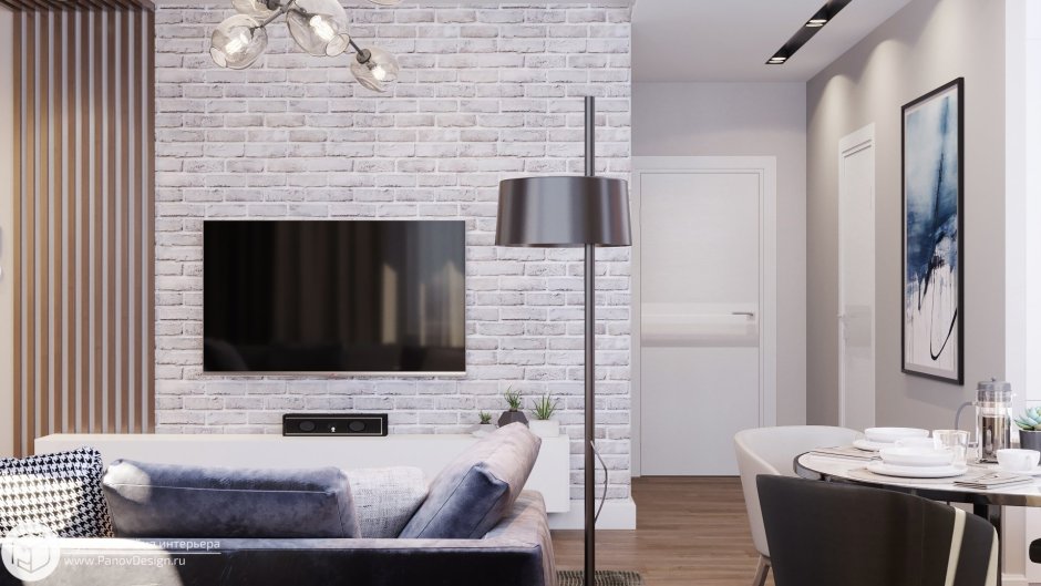 Телевизор на кирпичной стене