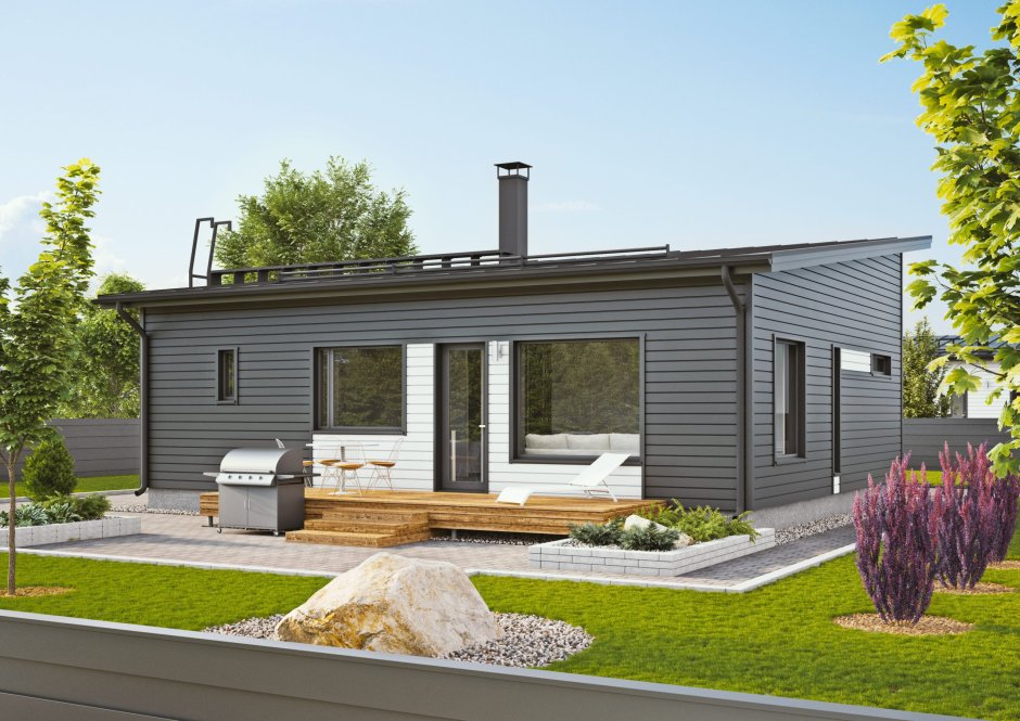 Компактный двухэтажный домик с односкатной крышей